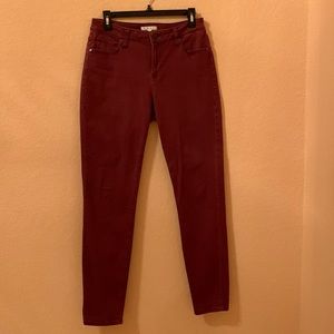 CAbi Size 8 wine colored straight leg jeans.  Spandex in cotton.